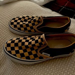 Vans that are black and gold